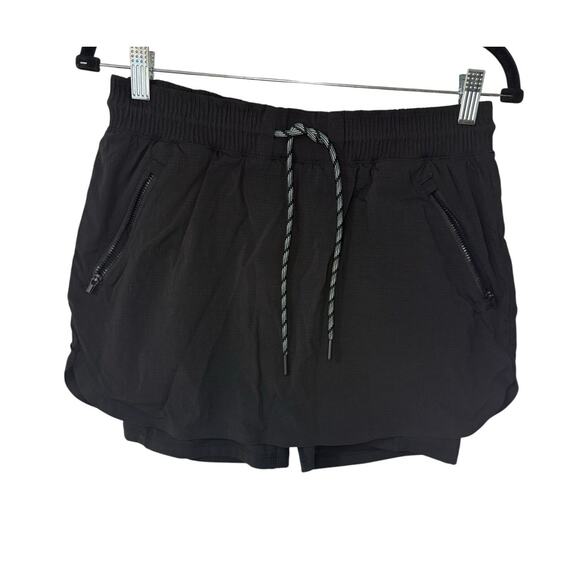 Athleta Dresses & Skirts - Athleta Skort Skirt Shorts Womens Sz 8 Black Front Tie Zipper Pockets Stretch
